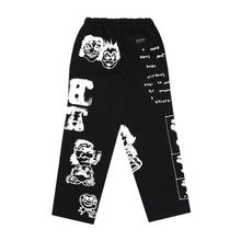 Load image into Gallery viewer, Devá States - Mk-4 printed easy pants , black
