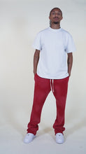 Load and play video in Gallery viewer, Eptm ; Sun faded sweatpants, red
