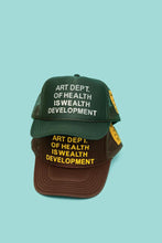 Load image into Gallery viewer, Petals and Peacocks ; Health is Wealth Trucker Hat, forest grn
